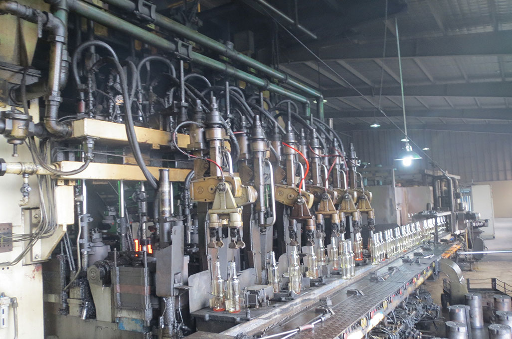 IS-machine for glass bottle production