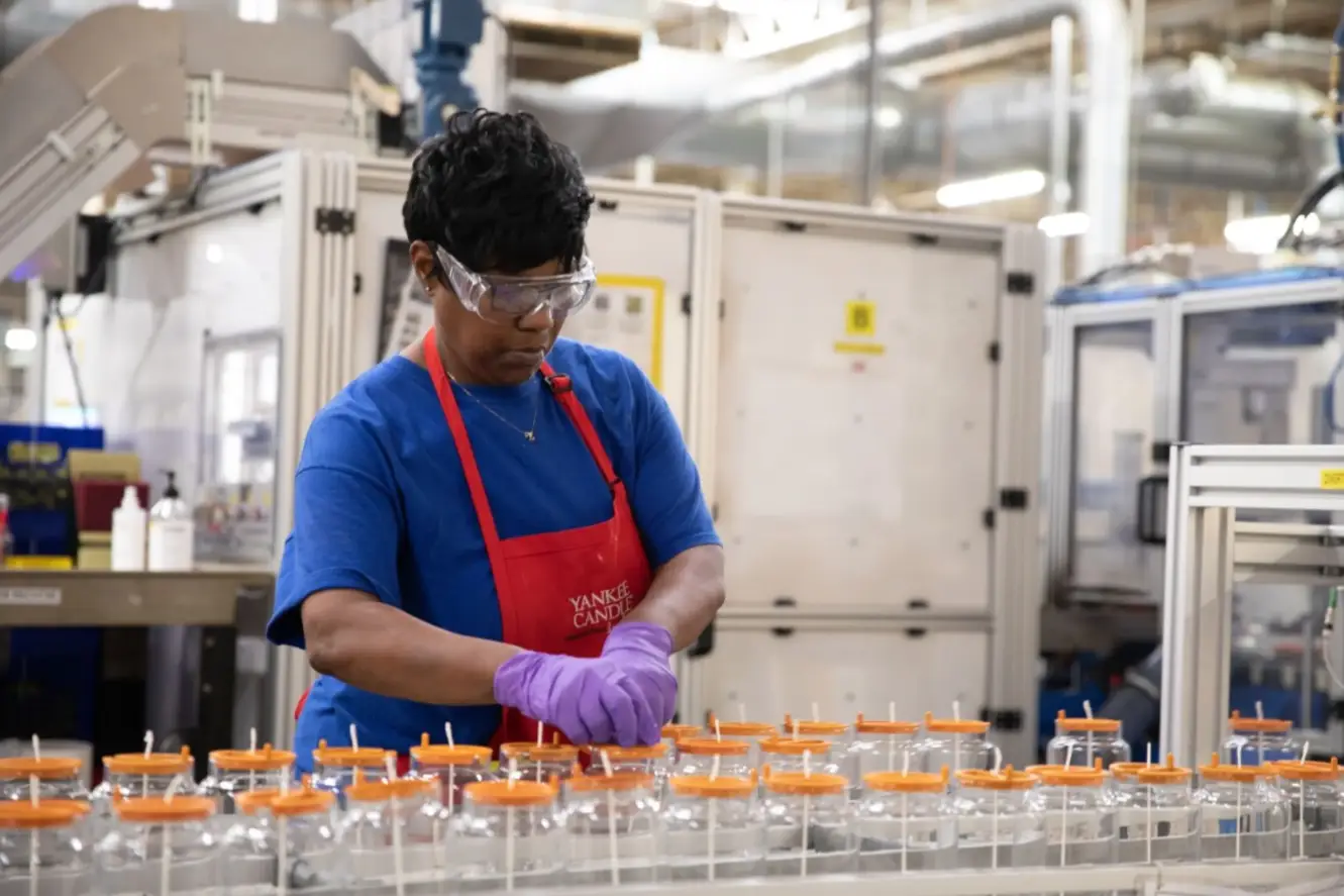 Visual representation of sustainability initiatives in Yankee Candle production