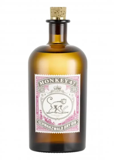 Monkey 47 Distiller's Cut premium gin bottle surrounded by Black Forest botanicals